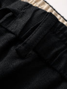 Belt loop detail on OROMEN Crosshatch Weave Drawstring Trousers