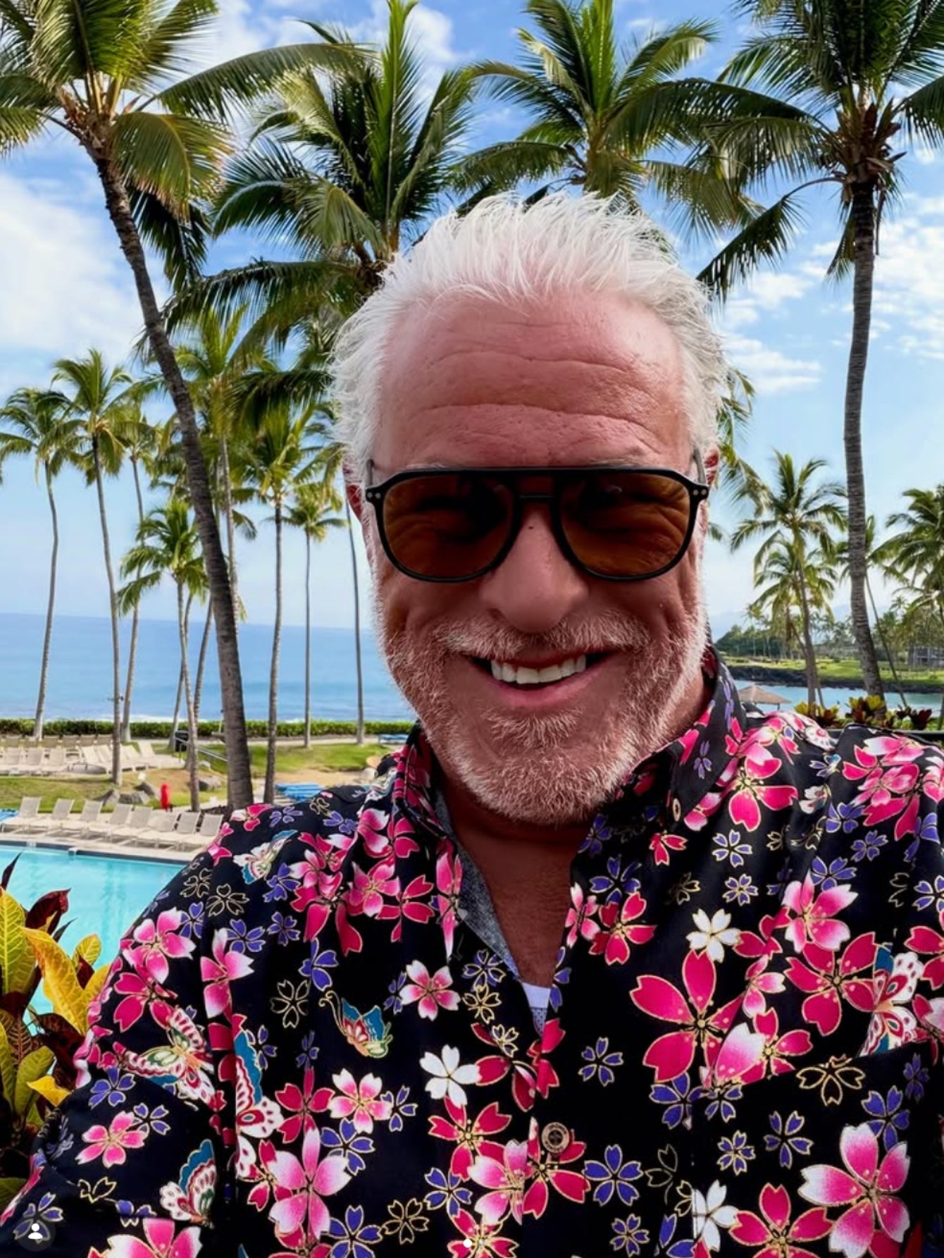 Black and pink sakura cherry blossom aloha shirt - in model