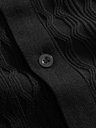 Button closure and placket detail of OROMEN Wave Jacquard Knit Polo