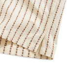 Button-down collar and coconut button detail