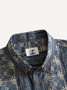 Button-down collar and neckline detail of OROMEN Indigo Batik Shirt