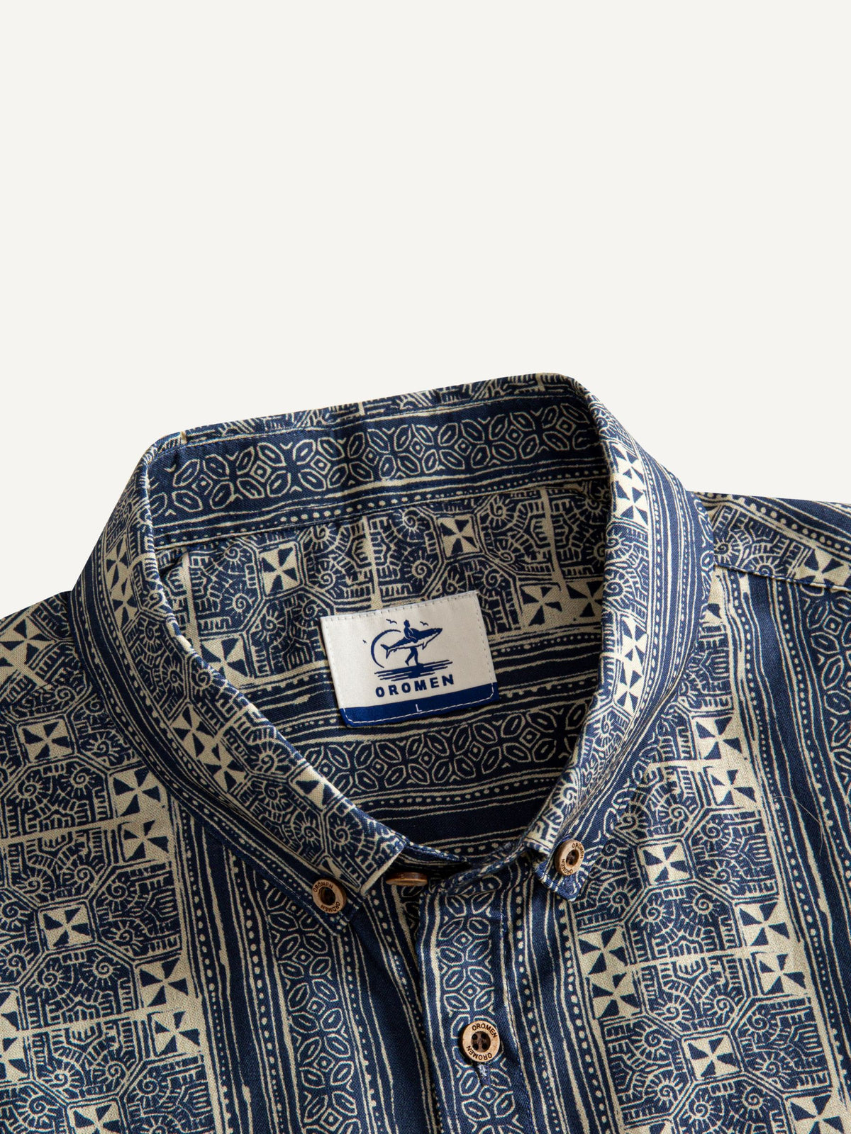 Button-down collar and neckline detail of OROMEN Indigo Batik Shirt