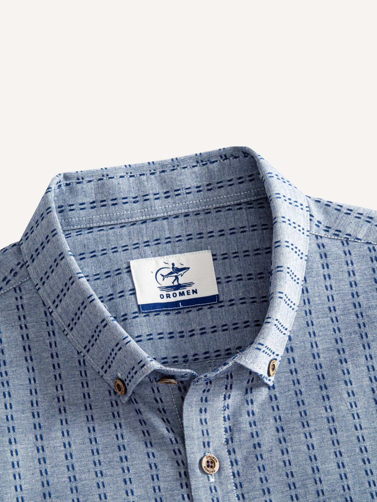 Button-down collar and neckline detail of OROMEN Sashiko Chambray Cotton Shirt