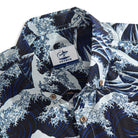 Button-down collar detail on Great Wave Hokusai shirt with Japanese ocean waves
