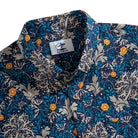 Button-down collar detail on Honeysuckle Vines shirt with nature-inspired botanical print