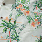 Camp collar detail with coconut tree print on OROMEN Elegant shirt