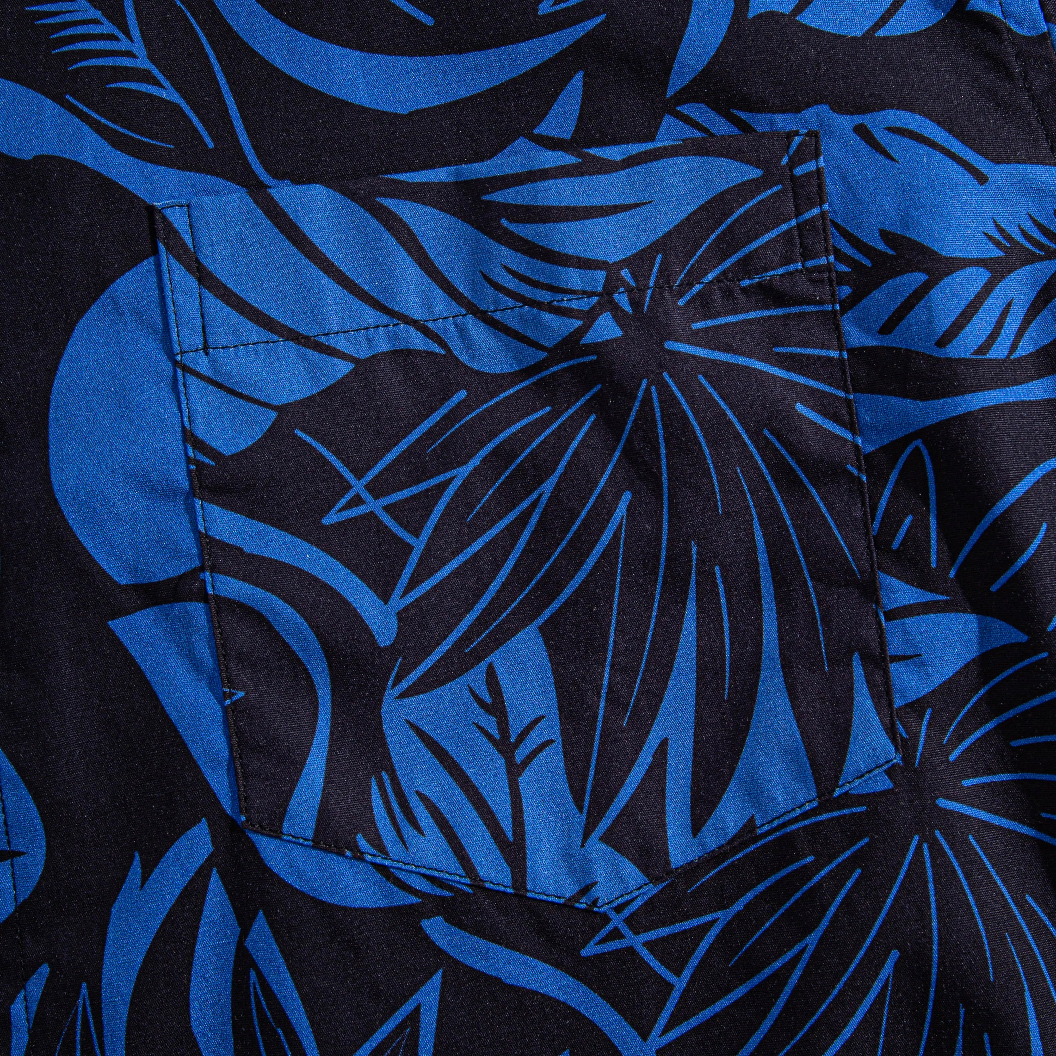 Chest pocket detail of OROMEN Blue Bush Hawaiian shirt with tropical leaf print