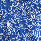 Chest pocket detail of OROMEN Plant Totem Hawaiian shirt – blue and white retro totem print
