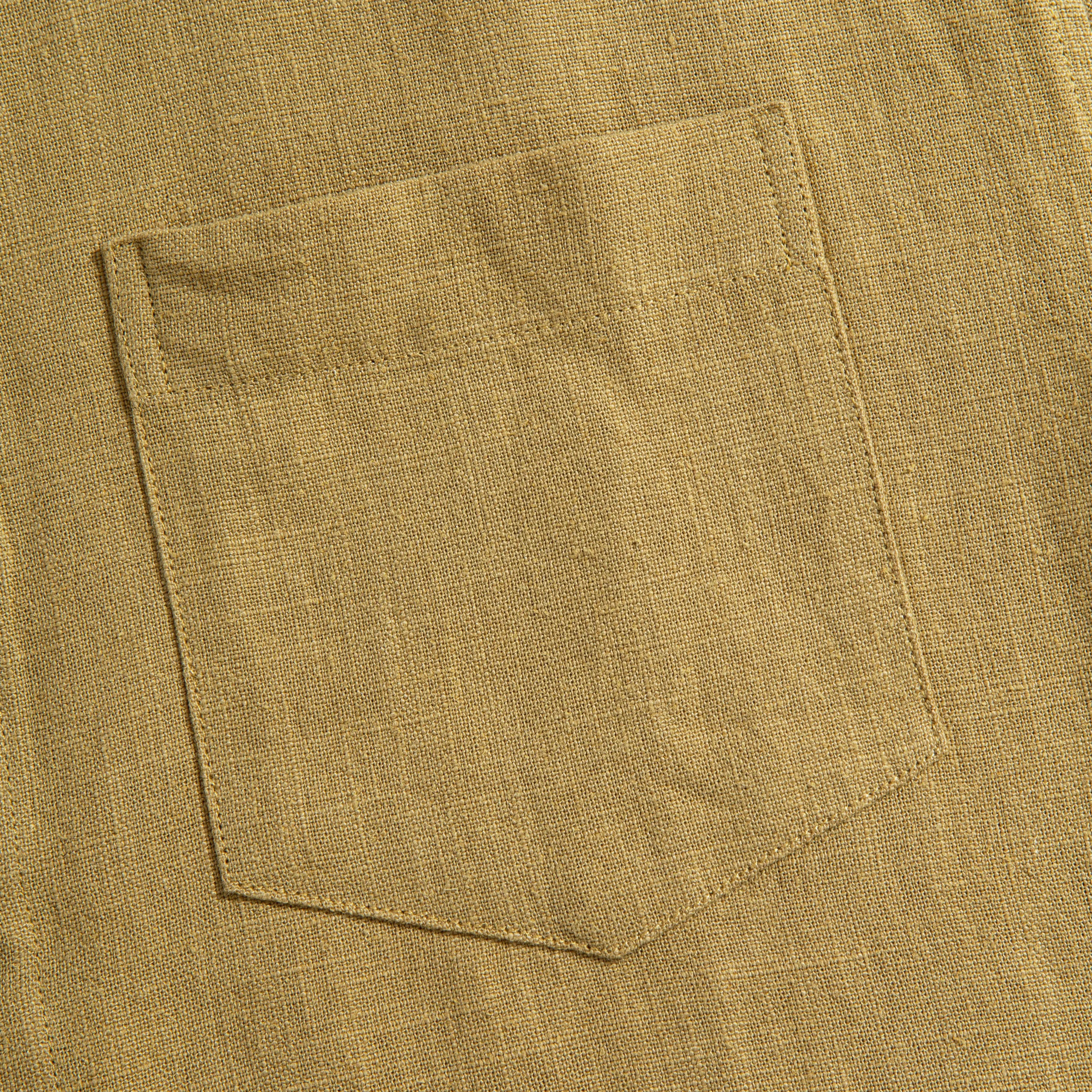 Chest pocket detail on tailored linen shirt - classic menswear styling