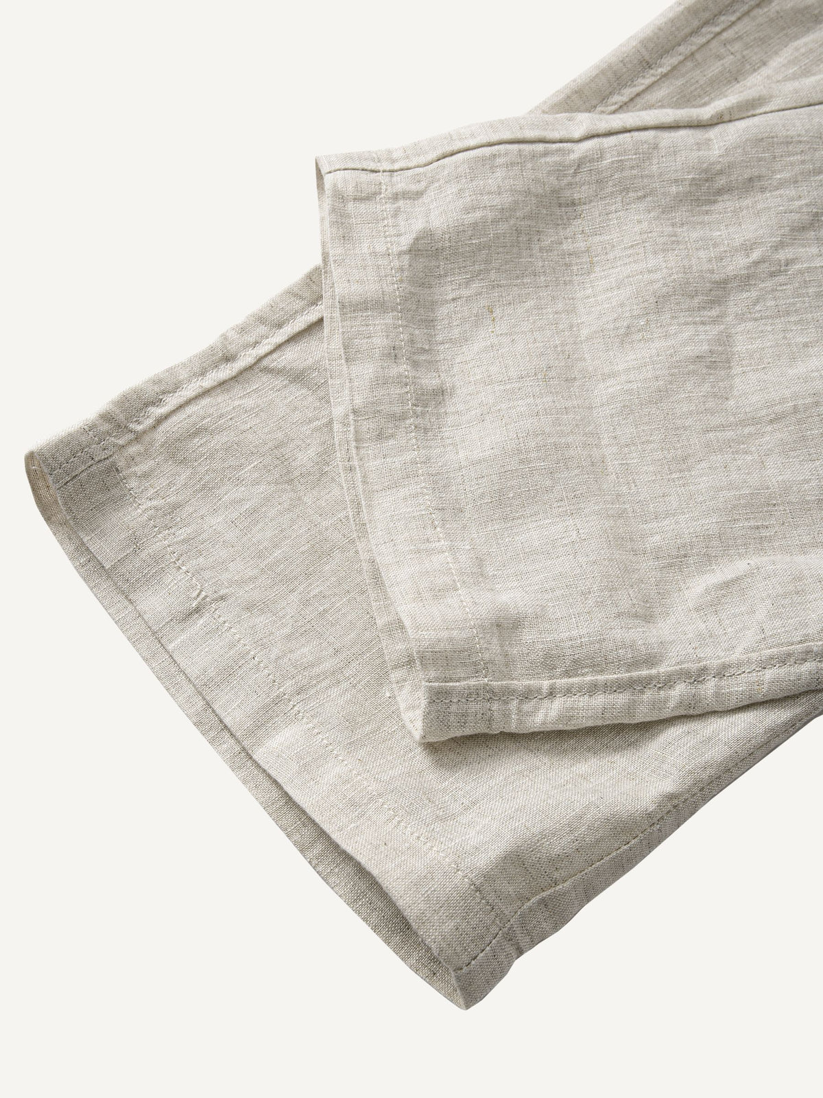 Clean hem and relaxed straight leg cuff detail of OROMEN Crosshatch Weave Relaxed Trousers