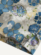 Clean hemline and side vent detail of OROMEN Cherry Blossoms in Full Bloom Shirt