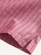 Clean hemline and side vent detail of OROMEN Sashiko Coral Cotton Shirt