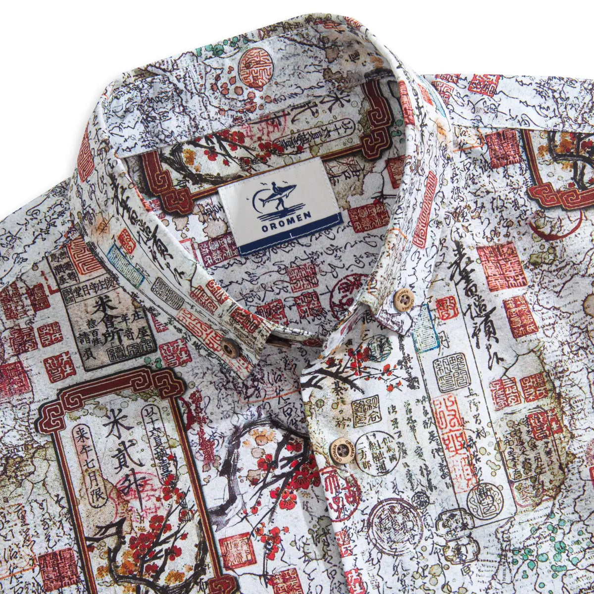 Close-up detail of red plum blossom print and traditional hanko stamps