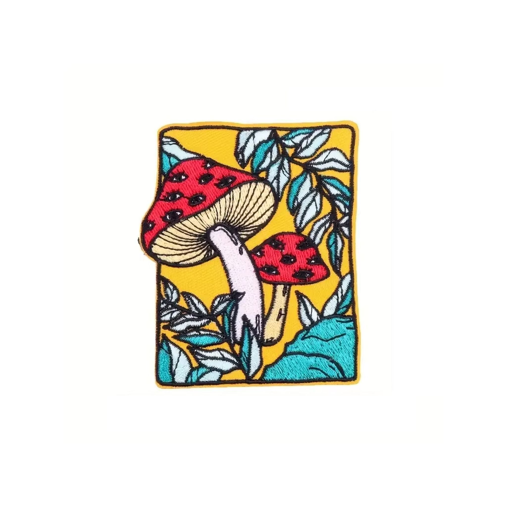Close-up of Wild Mushroom Botanical Embroidery Pattern Detail on OROMEN T-Shirt