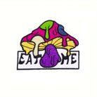 Close-up of "Eat Me" Psychedelic Mushroom Embroidery Pattern Detail on OROMEN T-Shirt