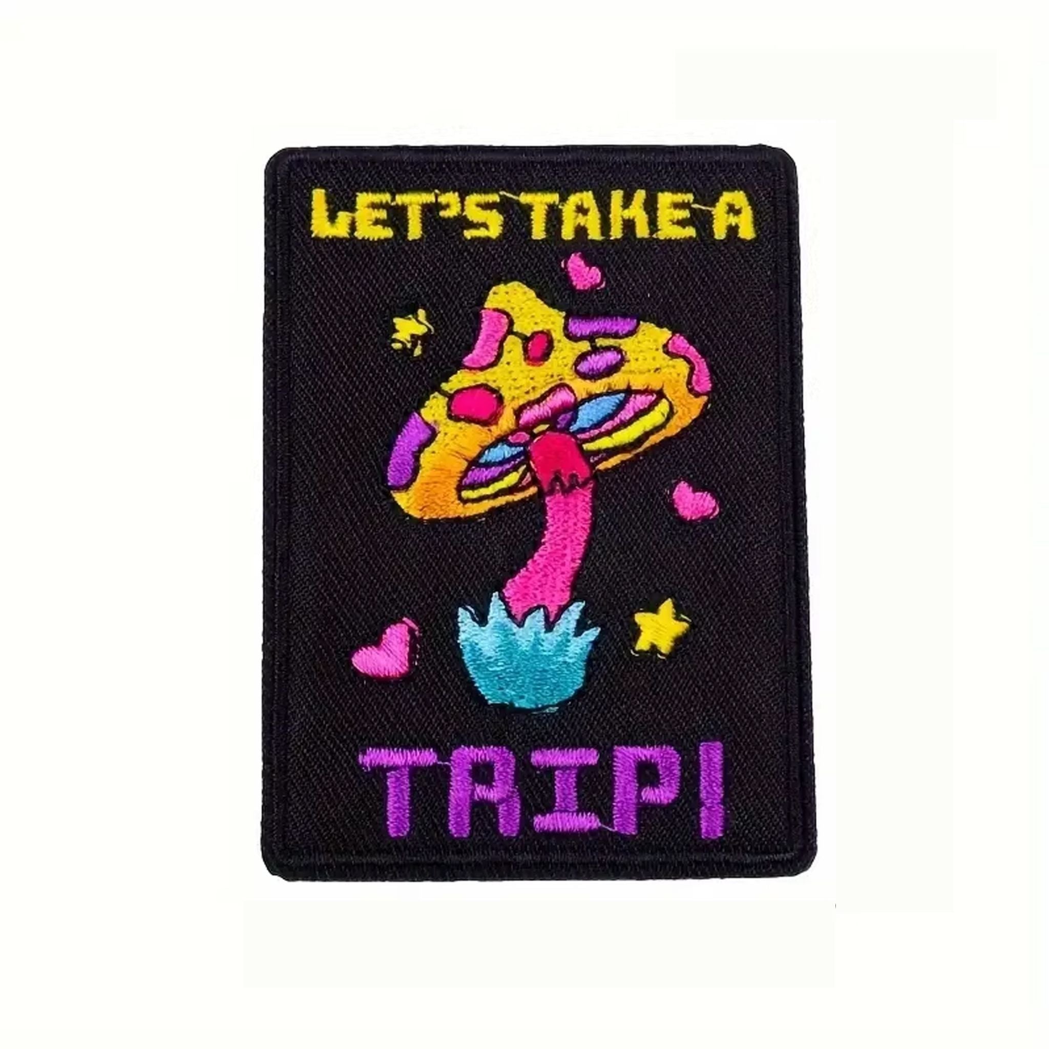 Close-up of "Let's Take A Trip" Pixel Mushroom Embroidery Pattern Detail on OROMEN T-Shirt