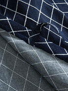 Close-up of adjustable front tie closures on navy Diamond Grid Haori Kimono