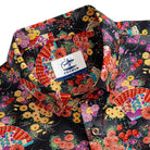 Close-up of cherry blossom ukiyo-e print detail on cotton shirt