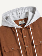 Close-up of contrast drawstring hood and collar on OROMEN Rust Hooded Utility Shirt
