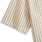 Close-up of embroidered textured stripe pattern detail