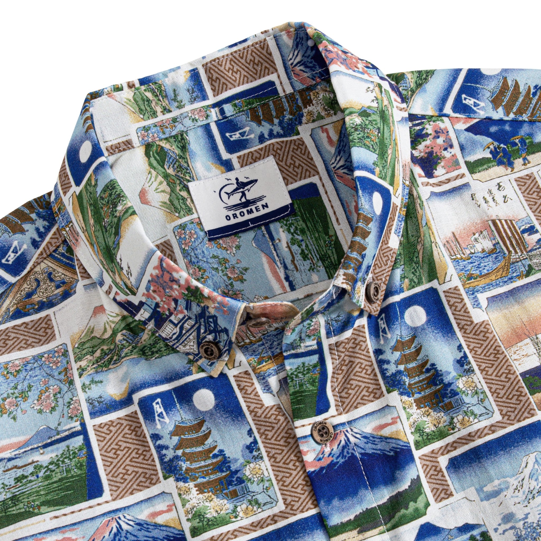 Close-up of hand-painted Ukiyo-e postcard prints on blue cotton aloha shirt