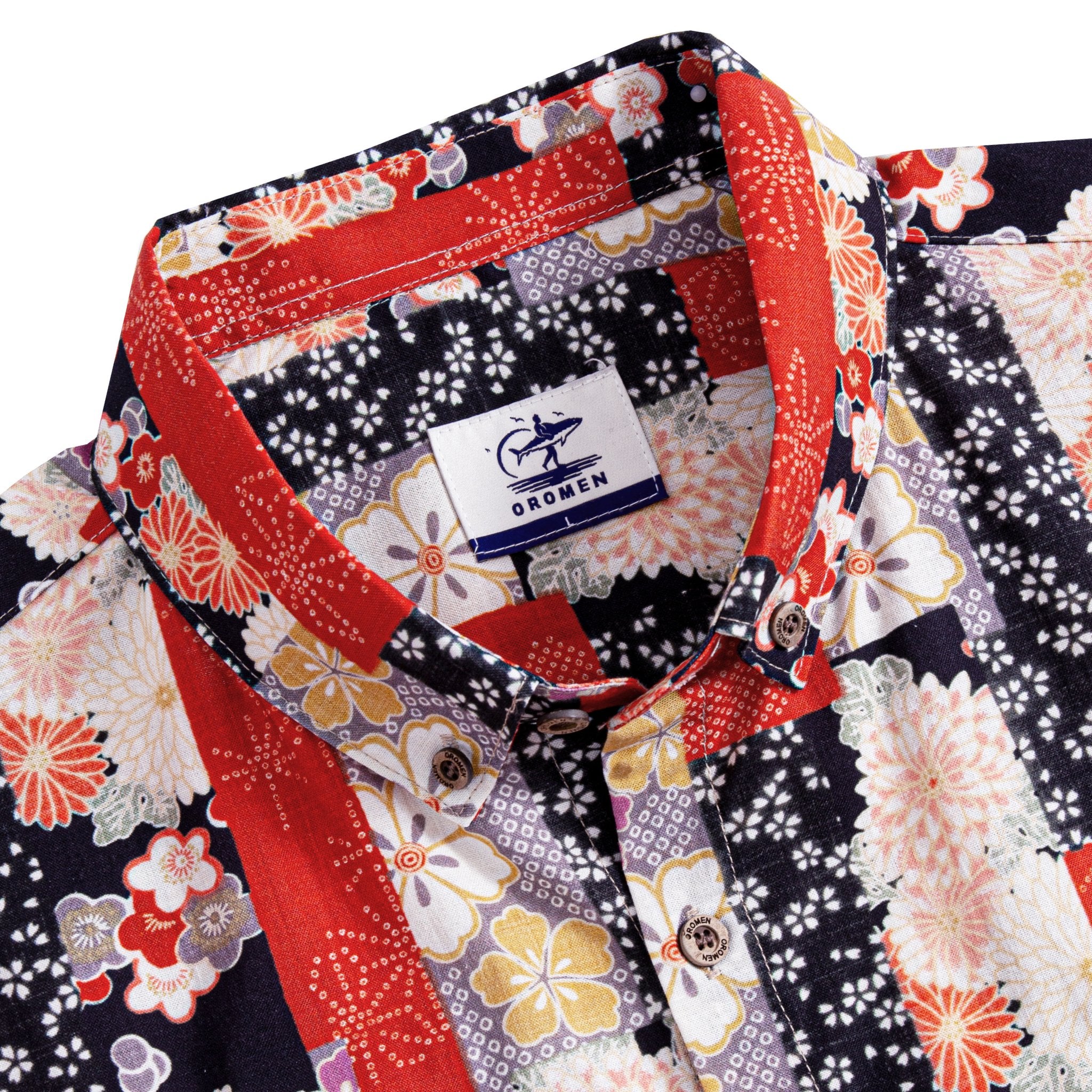 Close-up of hand-painted cherry blossom and geometric asanoha pattern on cotton fabric