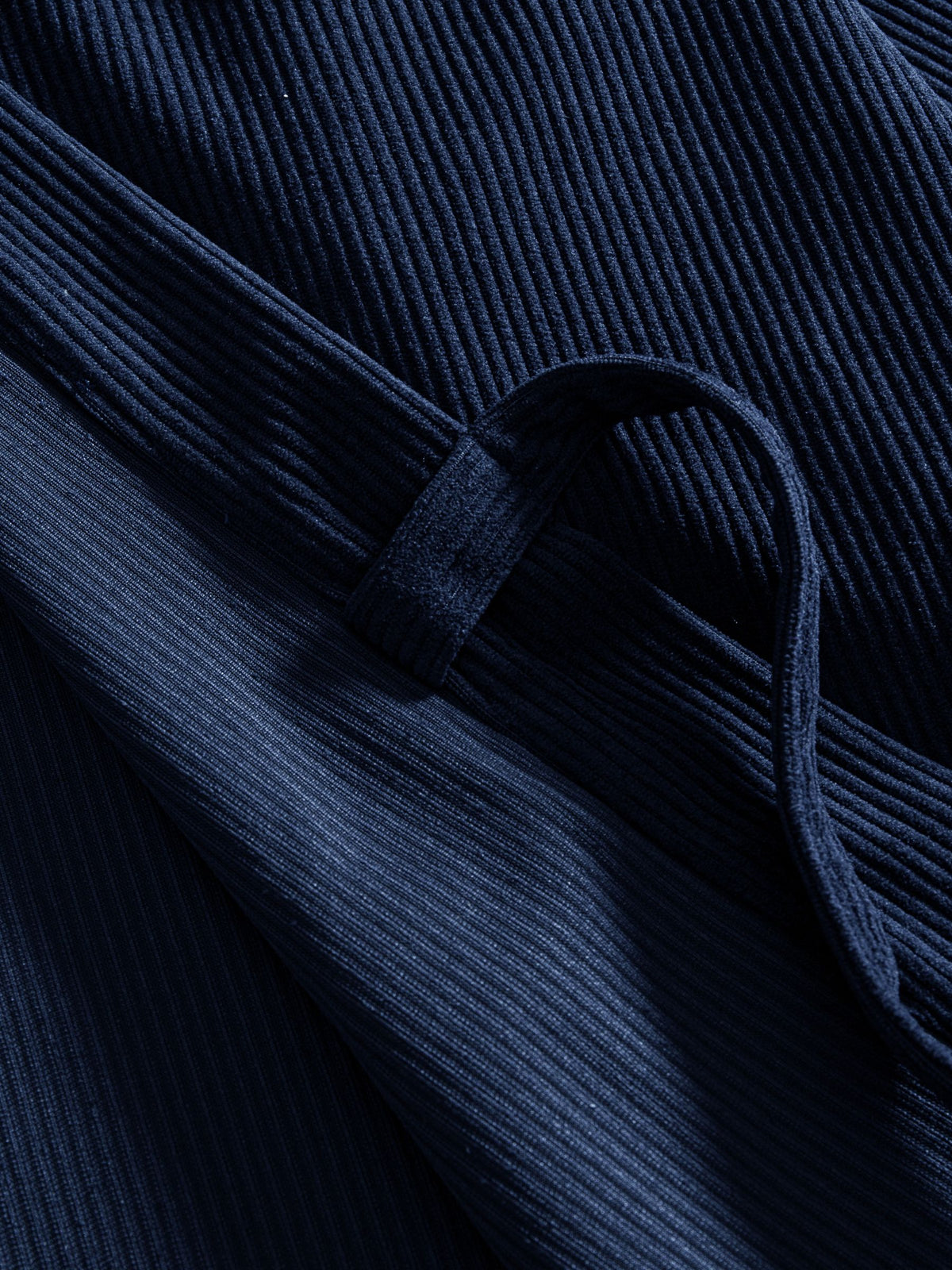 Close-up of the adjustable front-tie detail