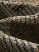 Close-up of the raised textured mosaic fabric
