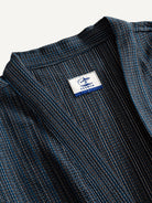 Close-up of the structured neckline and textured cotton-linen weave