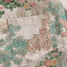 Close-up of traditional Japanese Ukiyoe cherry blossom and mountain landscape print