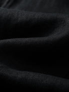 Close-up texture of 100% slub linen crosshatch weave on OROMEN Crosshatch Weave Drawstring Trousers