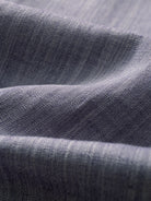 Close-up texture of breathable linen-cotton fabric on OROMEN Pleated Relaxed Fit Linen Trousers