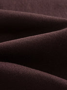 Close-up texture of ice silk viscose knit fabric on OROMEN Casa Mocha Knit Polo