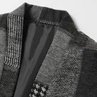 Close-up of OROMEN KIMONO021 collarless neckline, grey houndstooth patchwork fabric at collar edge, clean open-front finish