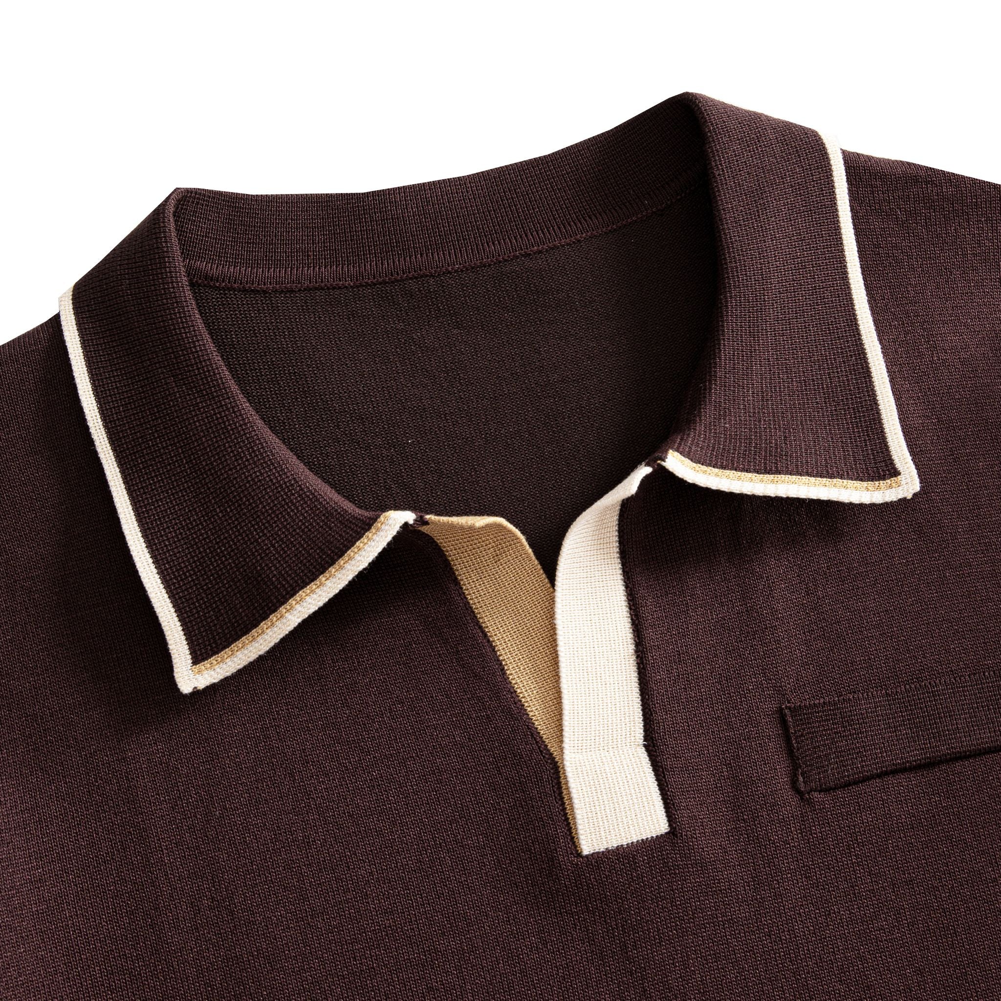 Close-up of polo collar on chocolate brown knit shirt, off-white
contrast tipping, open placket, smooth ice-touch viscose fabric