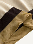 Colorblocked ribbed bottom hem detail on OROMEN Toasted Trim Knit Polo
