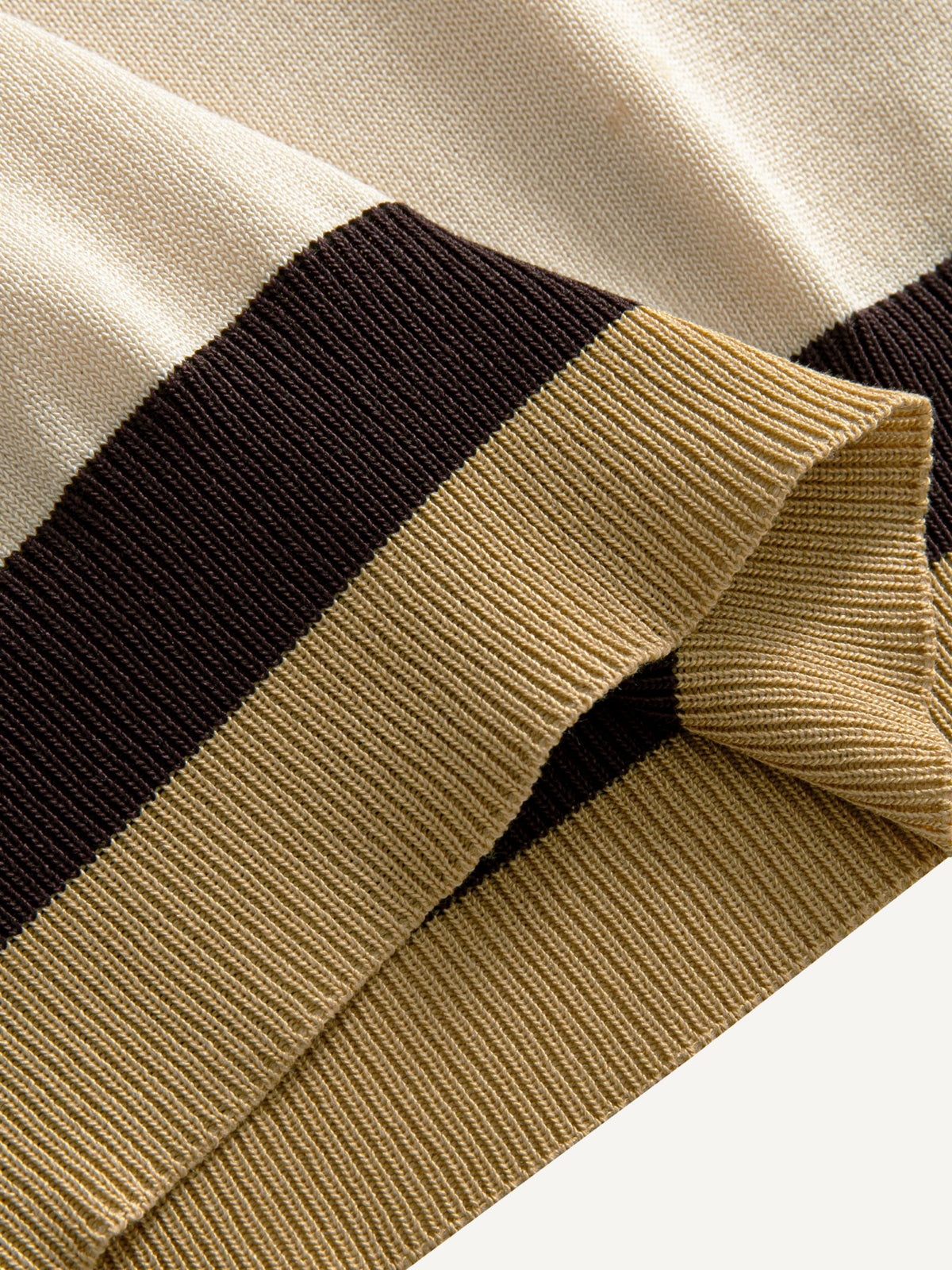 Colorblocked ribbed bottom hem detail on OROMEN Toasted Trim Knit Polo
