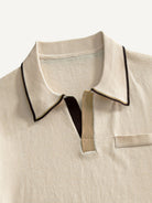 Contrast collar and open placket detail on OROMEN Toasted Trim Knit Polo