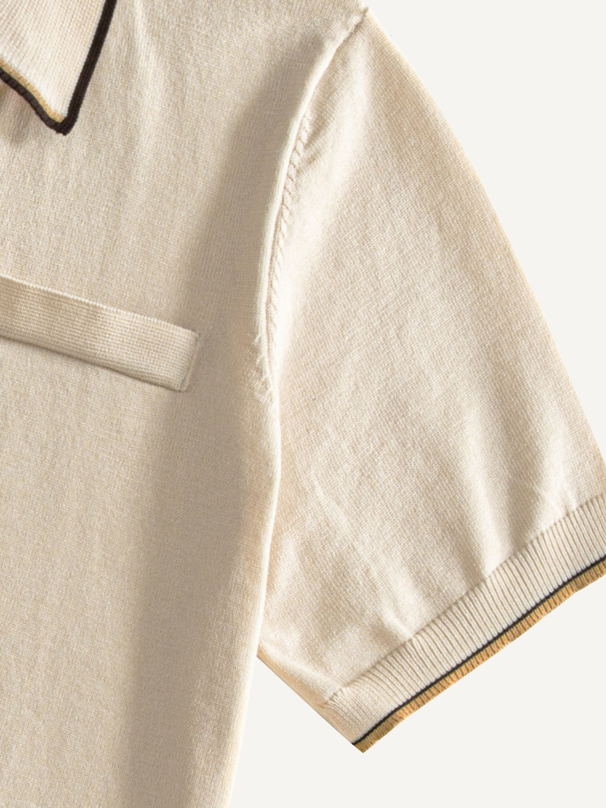 Contrast ribbed sleeve cuff detail on OROMEN Toasted Trim Knit Polo