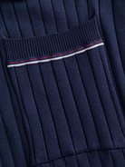 Contrast-tipped chest pocket detail on OROMEN Contrast-Tipped Ribbed Knit Polo