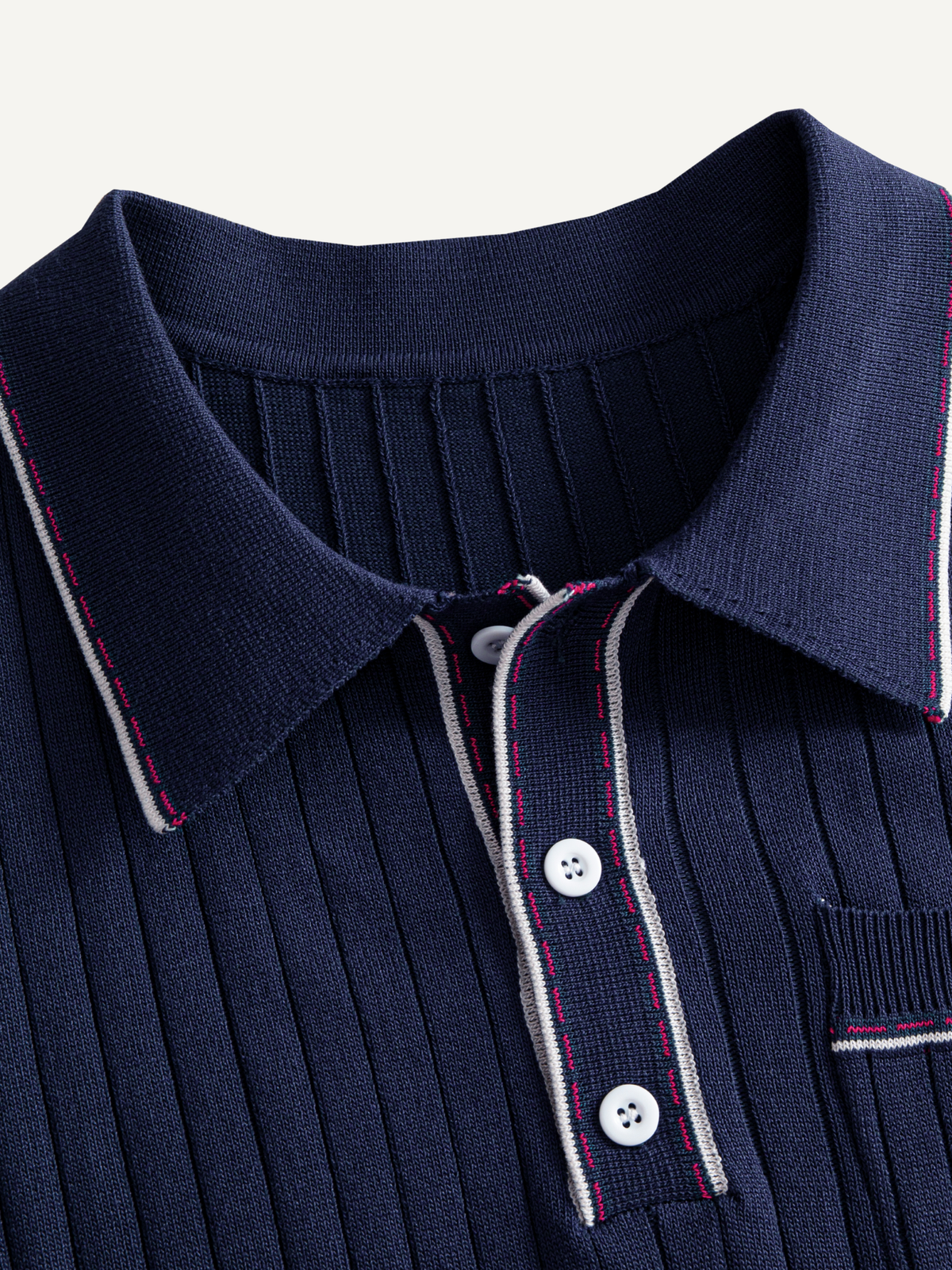 Contrast-tipped polo collar and button placket detail on OROMEN Contrast-Tipped Ribbed Knit Polo