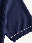 Contrast tipped sleeve cuff detail on OROMEN Contrast-Tipped Ribbed Knit Polo