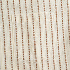 Cotton shirt side view showing natural coconut buttons