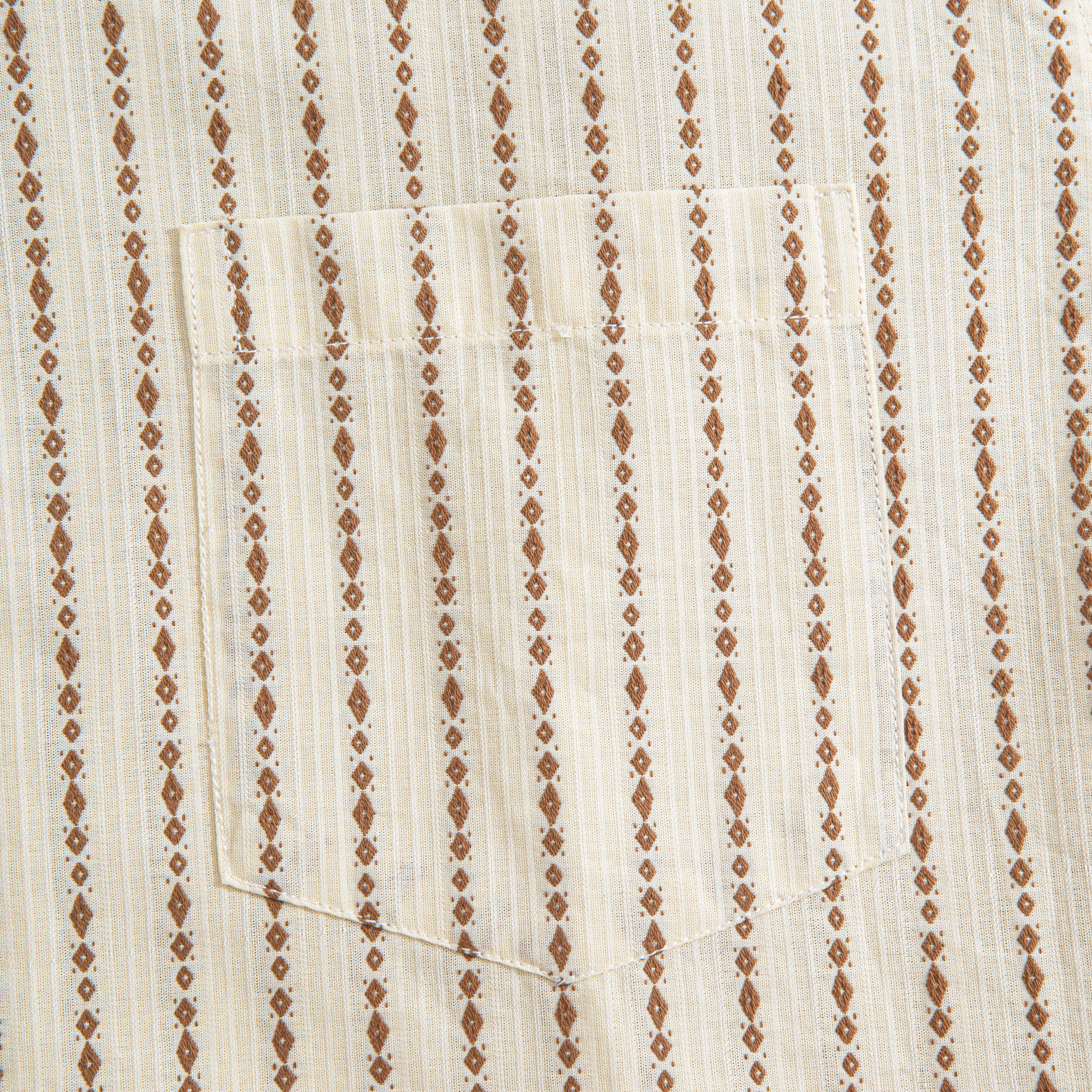 Cotton shirt side view showing natural coconut buttons