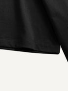 Double-stitched sleeve cuff and seam detail of OROMEN Banana Embroidery Tee