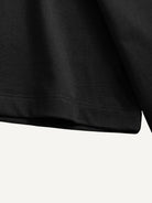 Double-stitched sleeve cuff and seam detail of OROMEN Bottle Garden Embroidery T-shirt