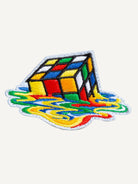 Embroidered melting Rubik's cube artwork detail on OROMEN T-shirt