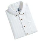 Folded OROMEN Embossed Striped Shirt – white Tencel™ linen button-down with coconut buttons and brand label