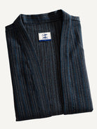 Folded flat lay of OROMEN textured tie-front kimono cardigan