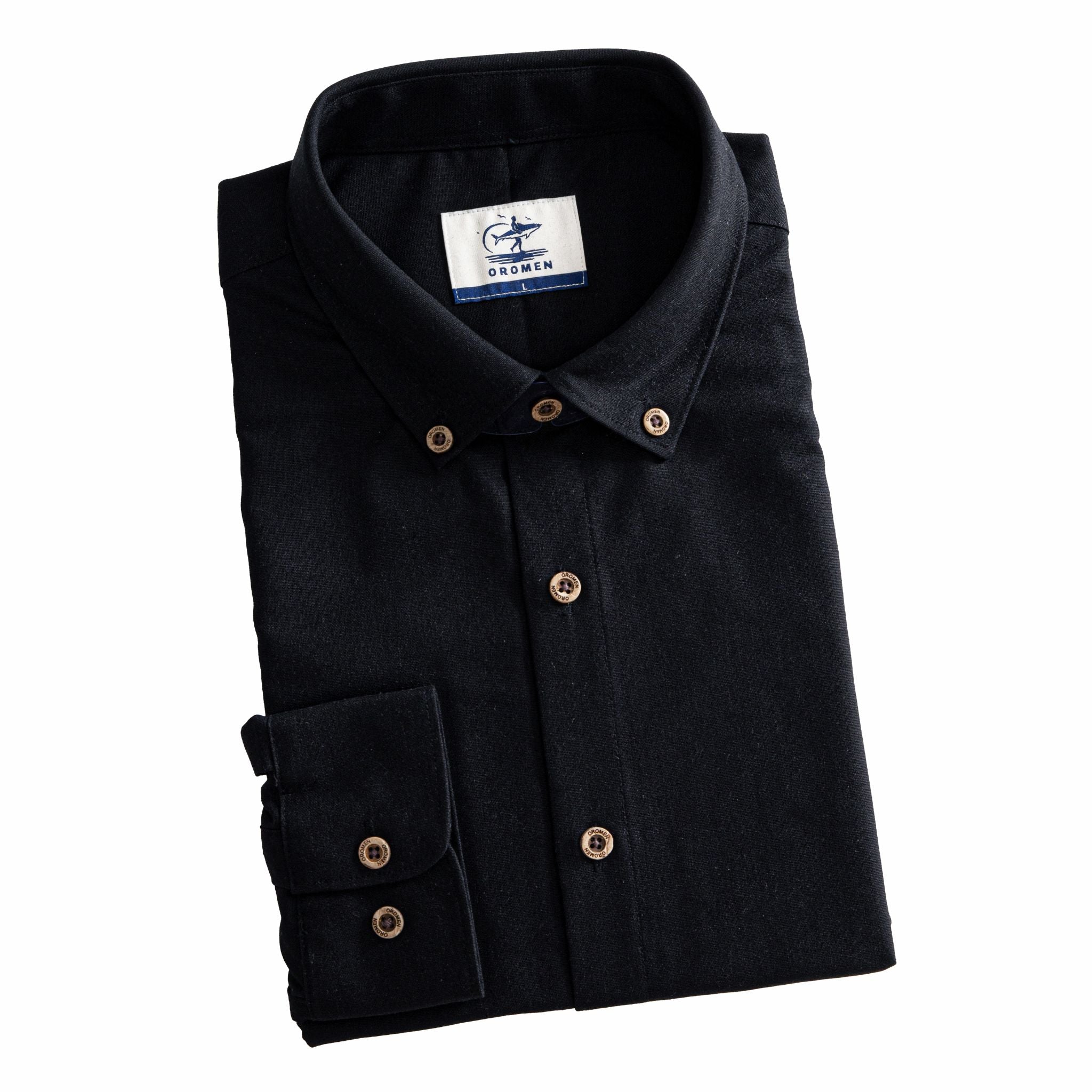 Folded men's black linen-cotton woven shirt, flat lay on white background – OROMEN